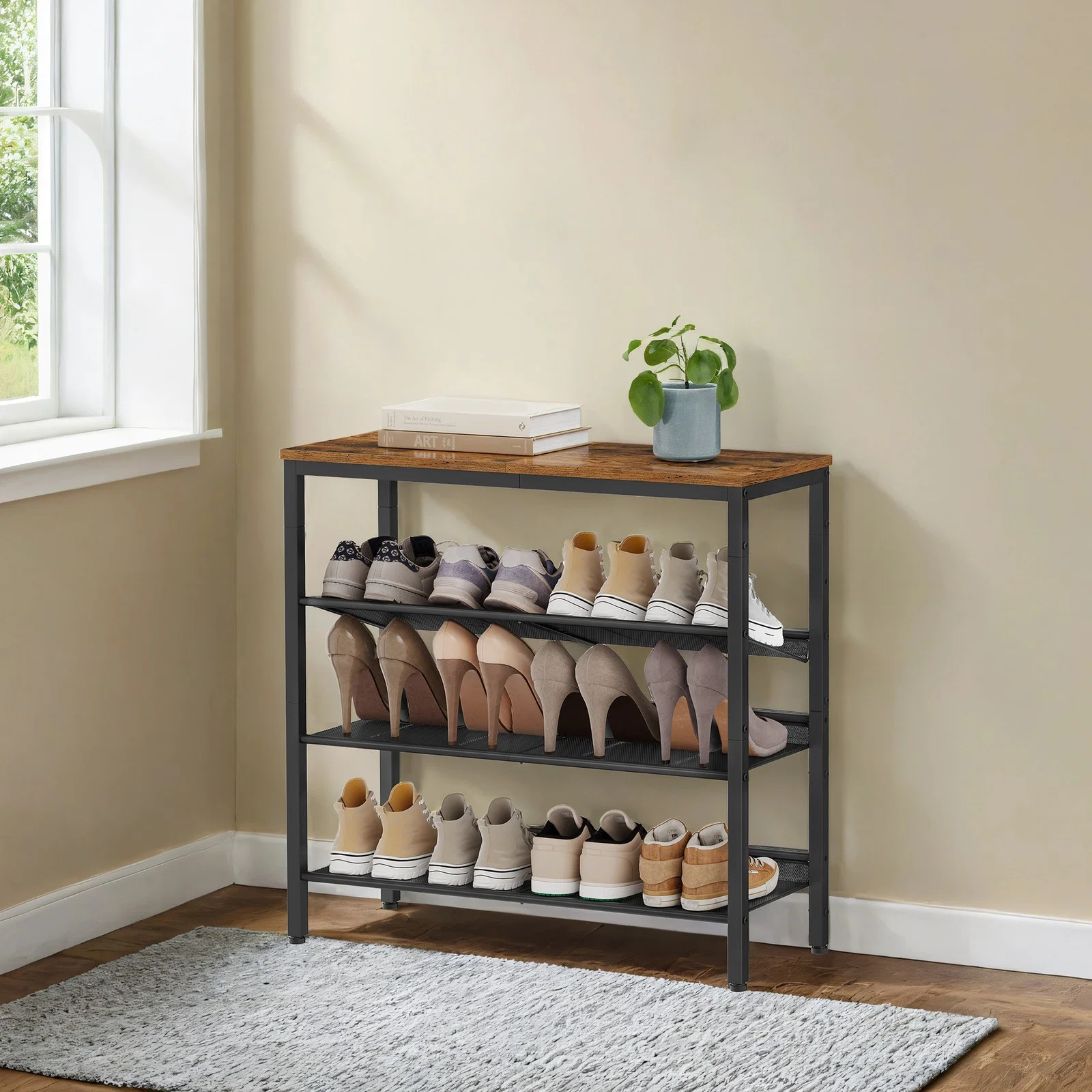 Stylish VASAGLE Four tier shoe storage rack with adjustable mesh shelves Proven