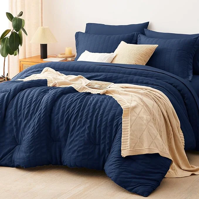 Powerful CozyLux Oversized King Comforter Set Navy Blue Seersucker 7 Pieces 120×98 Bed in a Bag Comforter Set with Sheets Luxury Soft Bedding Sets with Down Comforter Sheets Pillowcases amp Shams Detailed